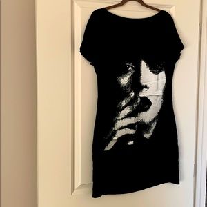 Short silk black dress.